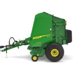 Left facing 561M Round Baler on a white background