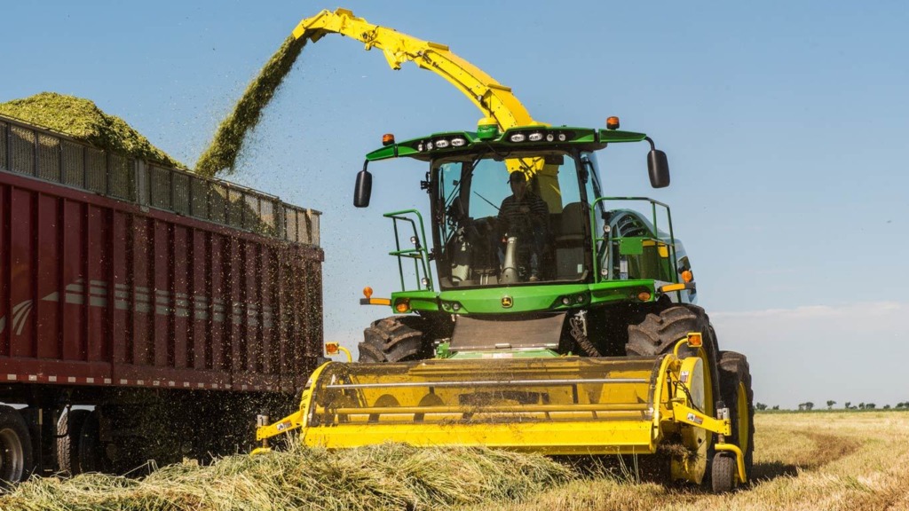 659 hay pickup at work in a field.