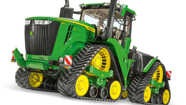 Tractor John Deere 9RX 640 con orugas, alta potencia y tecnología de agricultura de precisión.